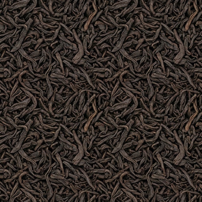 Seamless tileable texture of dried tea leaves in extreme close-up showing micro-detail