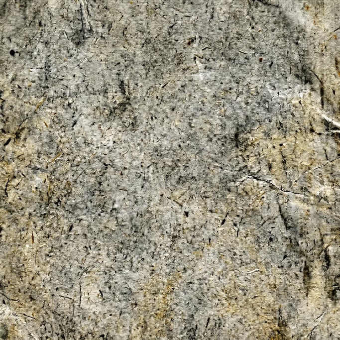 Seamless tileable texture of newsprint heavily worn and patinated