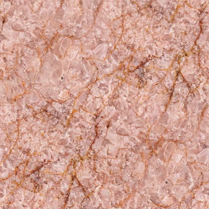 Seamless tileable texture of quartzite in rose at higher magnification