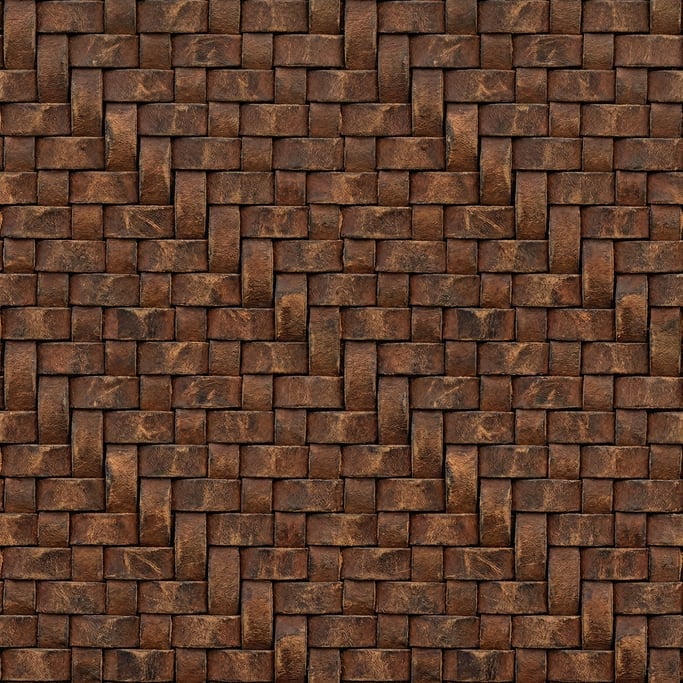 Seamless tileable texture of woven leather strips heavily worn and patinated