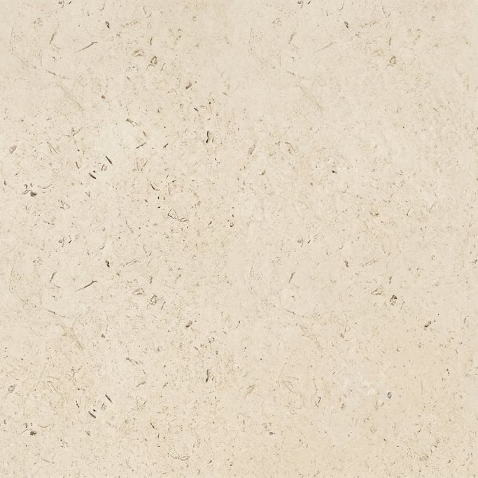 Seamless tileable texture of limestone in cream lightly weathered and aged