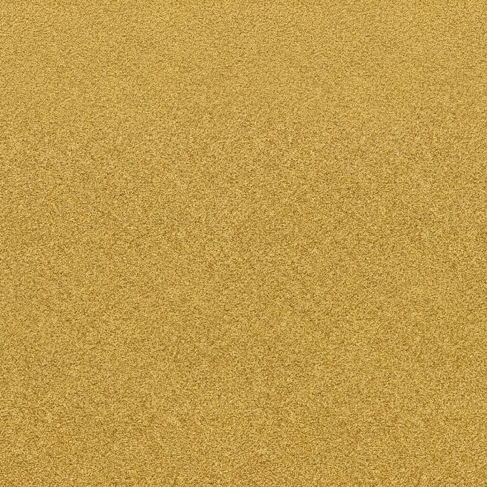 Seamless tileable texture of anodized aluminum in gold at higher magnification