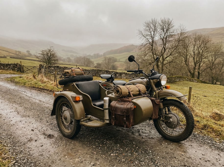 Sidecar motorcycle rig in olive drab parked on a gravel country road