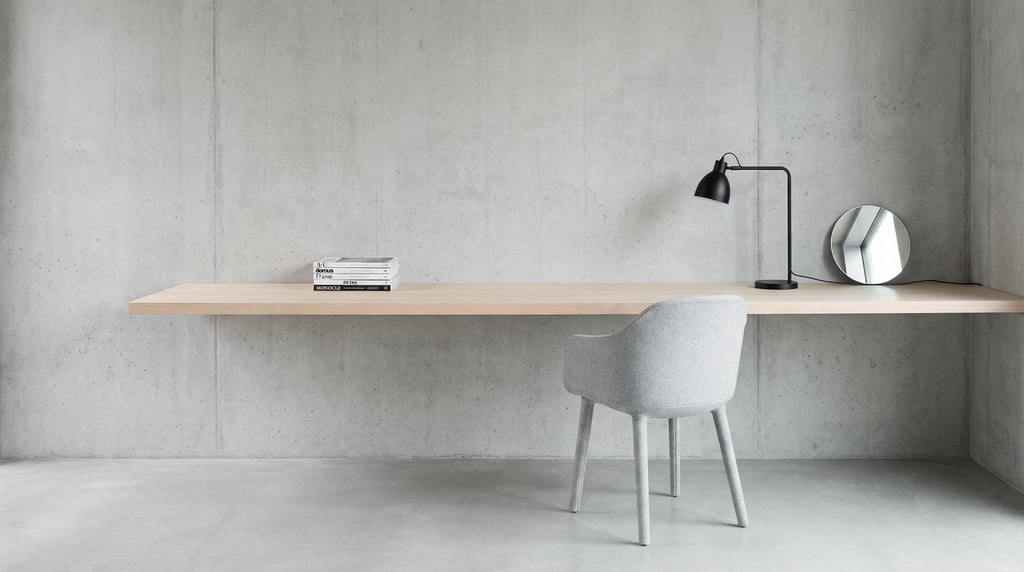 Straight-on architectural photograph of a monochrome minimal office