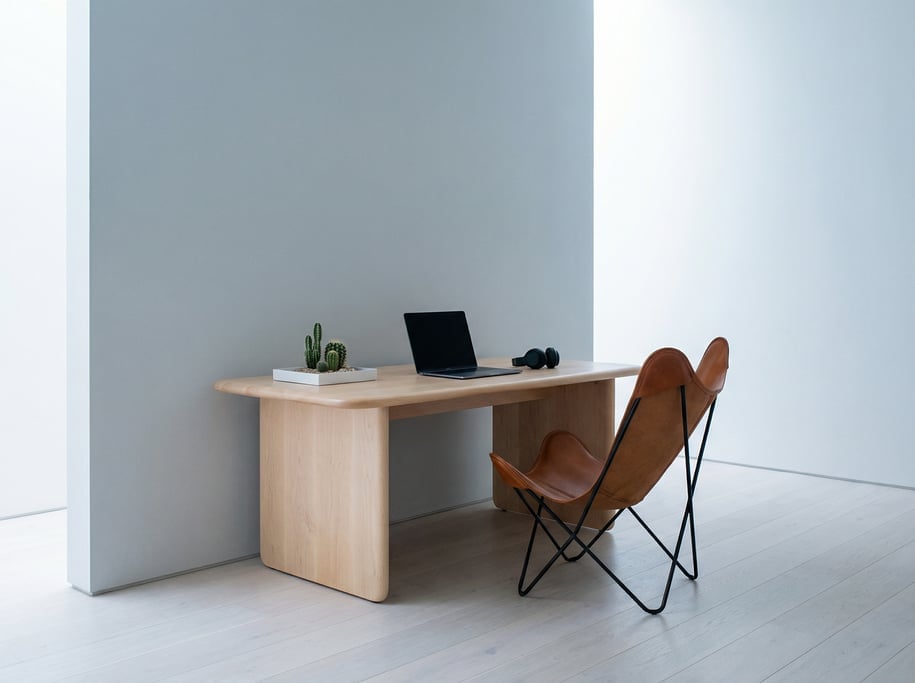 Wide-angle architectural shot of a designer's minimal studio