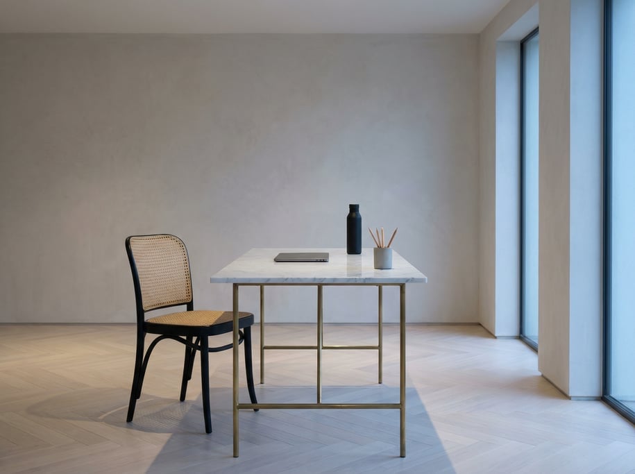 Frontal symmetrical view of a designer's minimal studio