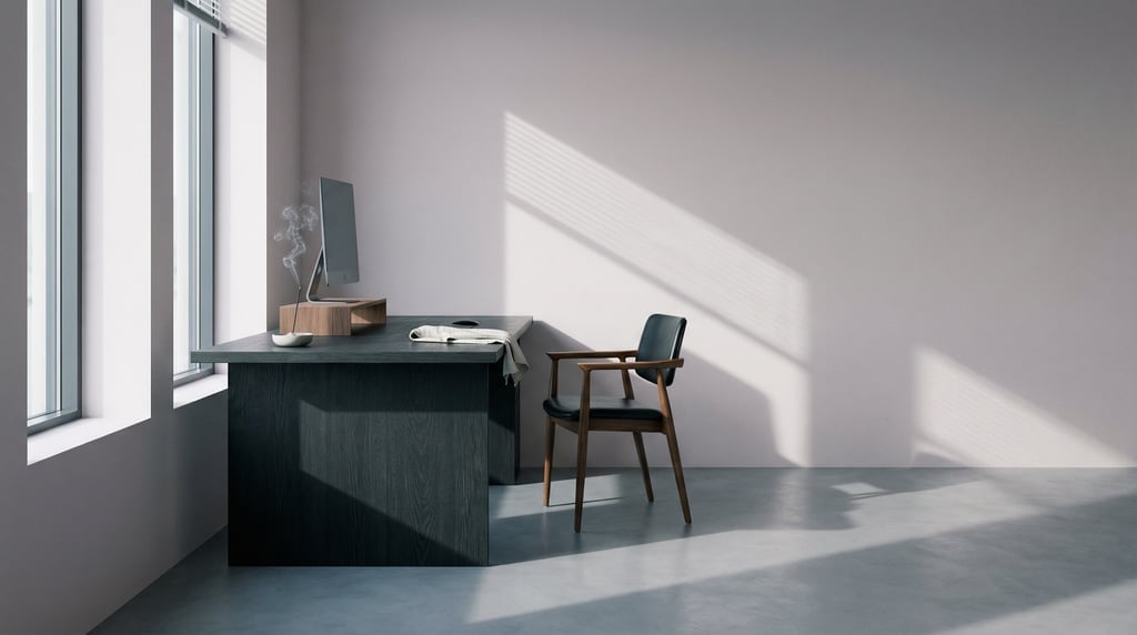 Wide straight-on photograph of a minimal illustration studio