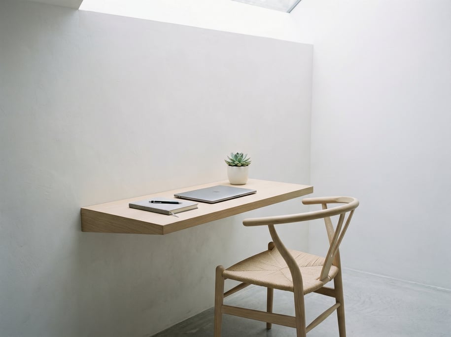 Low-angle photograph looking slightly upward at of a quiet reading and writing nook