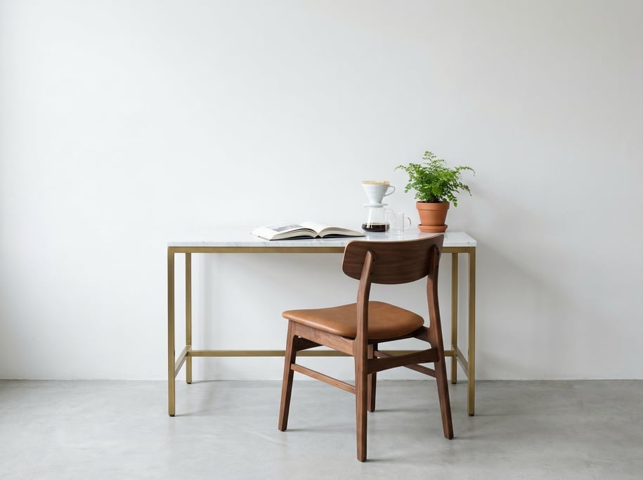 Frontal symmetrical view of a quiet reading and writing nook